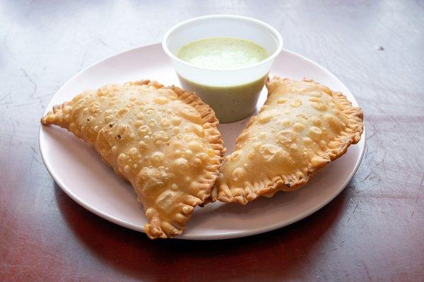 Empanadas with green sauce