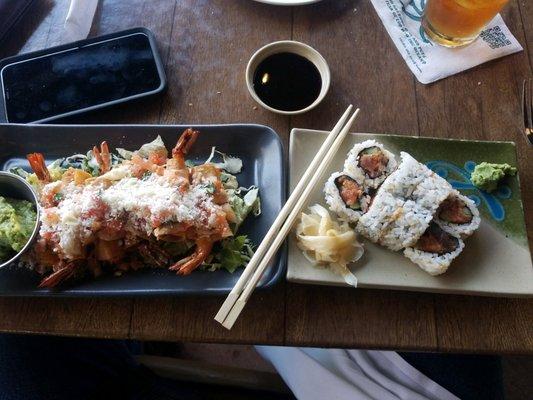 Awesome shrimp taquitos and sushi.