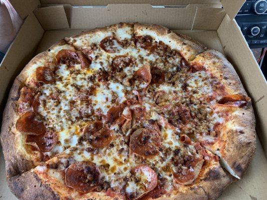 Large pepperoni and sausage pizza