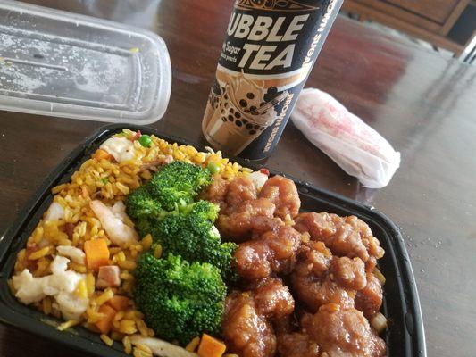 General Tsos combo with egg roll and boba tea.