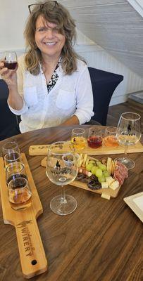 Super Yelper Isobel L. sampling the wine flight & Charcuterie-Fromagerie board at Antelope Valley Winery.