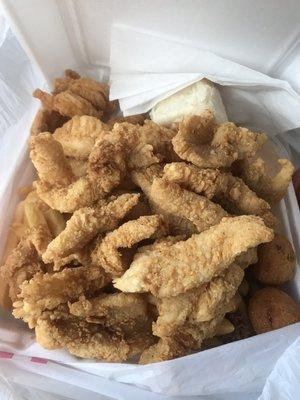 Catfish nugget dinner for 15.49 comes with fish, fries, hush puppies, salad, and dinner roll, and it's as good as it looks