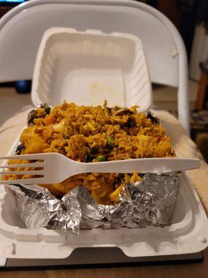 Pineapple Fried Rice with Chicken (fork is for scale)