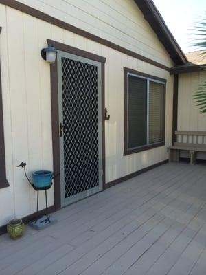 Security screen door installed on a customer's home entryway.