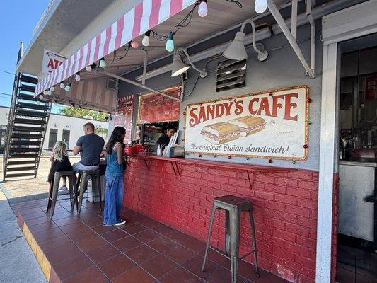 Walk up counter with limited seating to eat on site