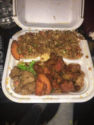 Sesame chicken, pepper steak, and shrimp fried rice.