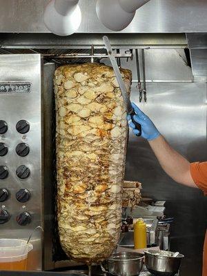 Chicken Shawarma getting sliced