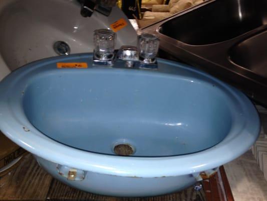 $5 for a blue sink; the knobs were in very good condition