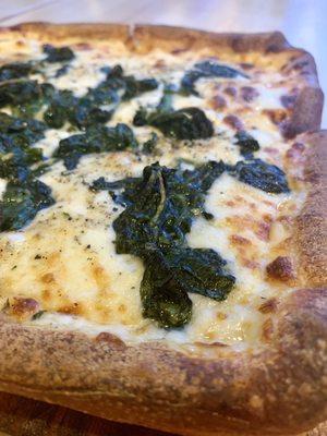 Personal (9") white pizza with spinach and extra cheese. Delicious. Highly recommend.