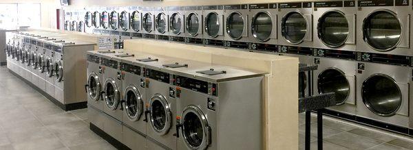 Large new coin laundromat. Air conditioned, Clean, spacious and attended. Free dryers