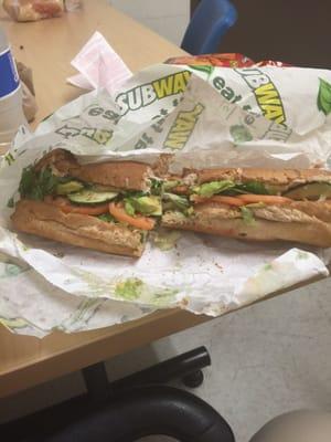 Tuna footlong wheat bread with avocado, extra shredded cheese. I can't really taste the cheese though. :/