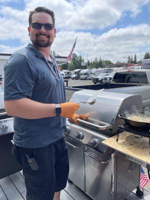 Alex Coumbs Cooking burgers for the customers