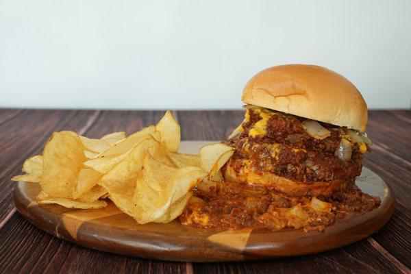 1/2 Pound Ribeye Burger, Homemade Ribeye Chili, Grilled Onions, & Nacho Cheese on a Fresh Baked Bun.