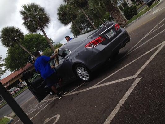 Crew on hand Drying Vehicles