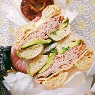 Sweet Windsor (honey turkey, muenster, avocado and honey mustard) on plain bagel