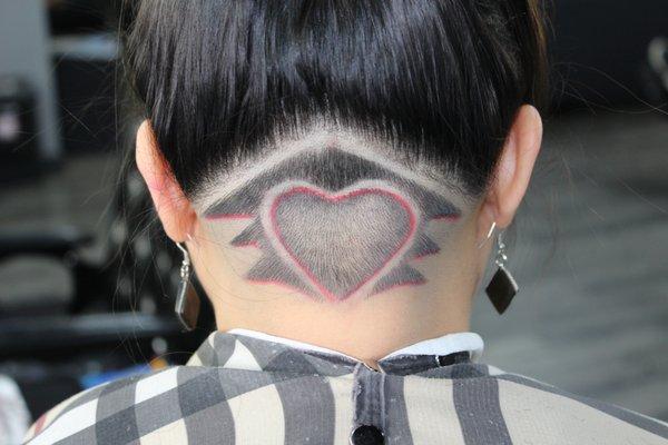 Clean cut taper neck Valentine's Day design. Make your appointment with us today.