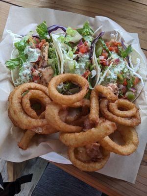 Onion rings $5 and salmon tacos $17