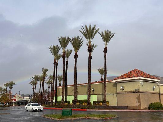 Rainbow over the outlets on a rainy December day