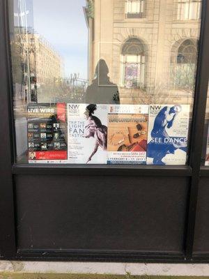 Example of posters in downtown windows.