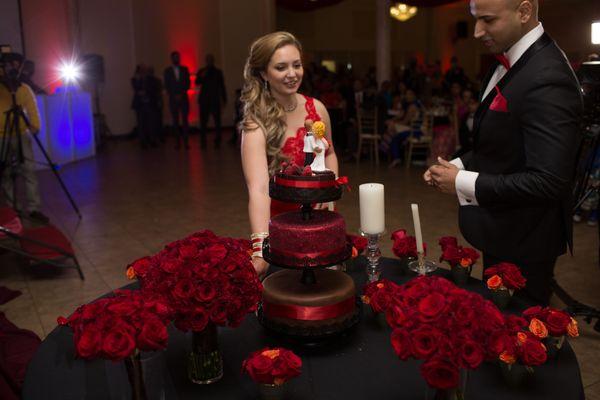 Cake table as decorated by staff with cake and flowers from a different vendor.