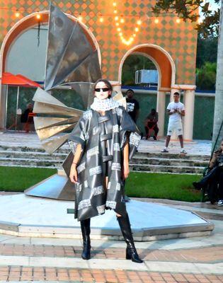 THOS student fashion designer Nina Torok for 'Nina Torok' debuts leather kaftan overcoat from her final presentation collection 2023