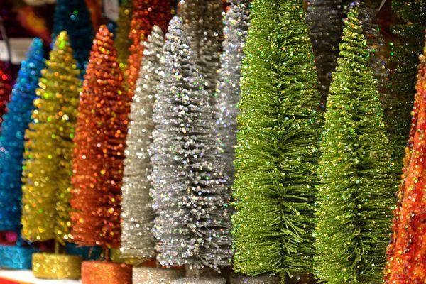 Small glittered Christmas trees in our trees department