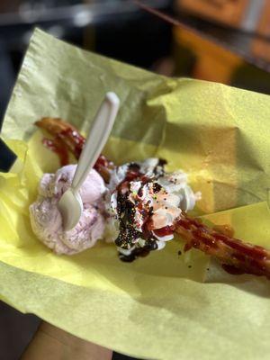 Churro with strawberry ice cream