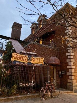 Go up the stairs to enter Firehouse Bicycles on the second floor!