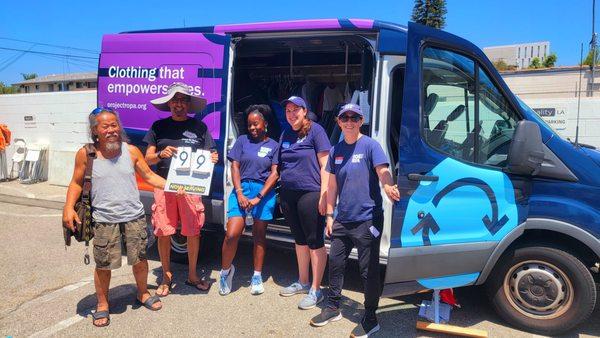 Staff and volunteers from Project Ropa's Mobile Clothing Closet service.