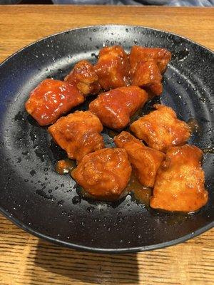 Boneless wings on a wet plate