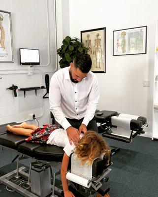 We offer chiropractic adjustments for kids, which helps align the spine and neck and also clears neural pathways.