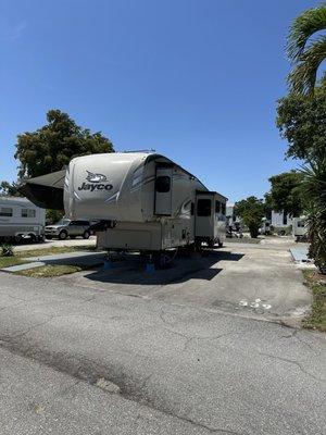 Very tight! There's an open spot directly to the right of the Rv. Hope no one gets assigned this spot.