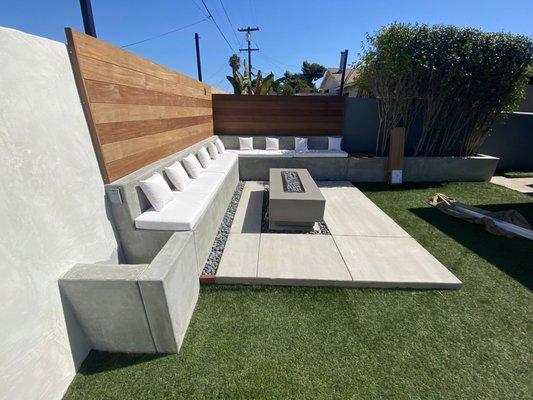 Landscape remodeling San Diego.
 Custom concrete bench and fire pit