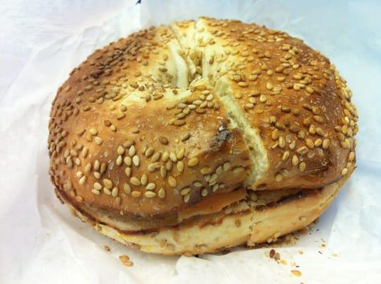 Lox & cream cheese on sesame bagel.