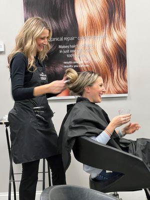 Our wonderful stylist Tiffani sharing a laugh with a client