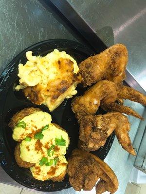 Mac and cheese deep fried devil eggs and chicken wings