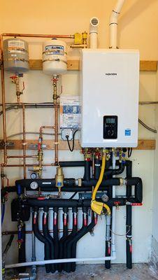 Combi boiler for under floor, radiant system installation