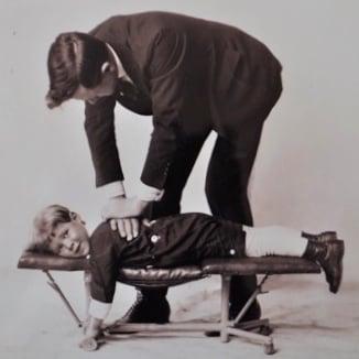 Dr. Floyd McNown adjusting Willard McNown, 1914