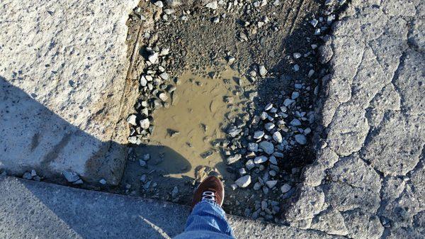 Parking lot potholes are huge!