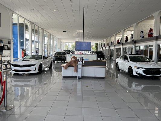 That's one heck of a wax job...oh, and the cars look good too!