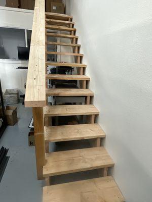 Staircase leading to loft area used for storage