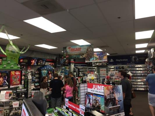 People enjoying their GameStop experience.