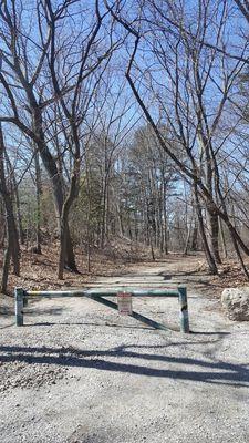 Entrance to walking trail leading to Brook Farm. There is parking for maybe 3 cars to the right.