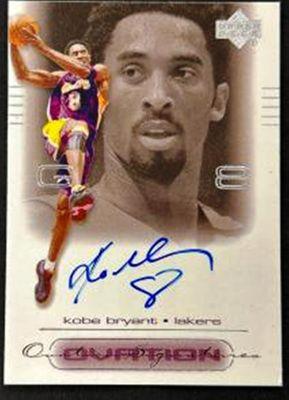 Kobe Bryant 2000 Upper Deck autographed card. The top has been trimmed at his hair line.