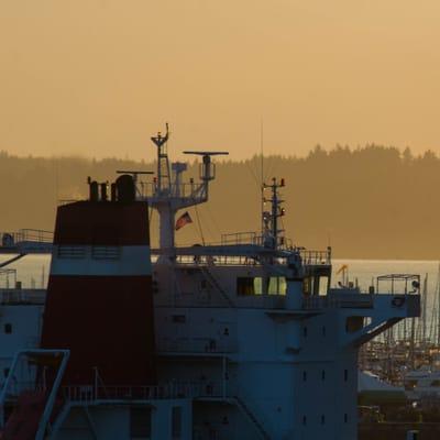 A ship unloads at the grain elevator of the Seattle waterfront