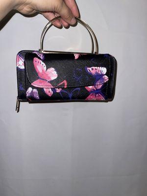 Butterfly purse and has longer metal strap