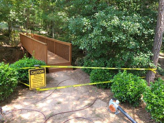 Neighborhood bridge Renovation and new coat of stain