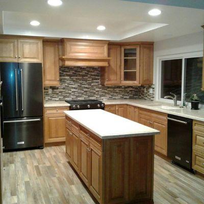 Walnut kitchen Maple Honey cabinets with,Quartz counterops