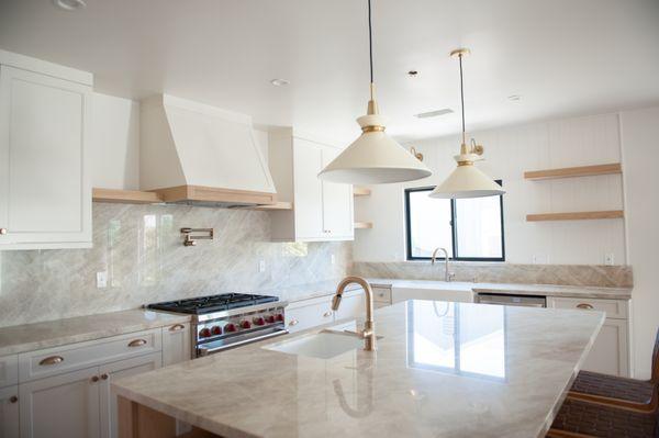 Custom cabinets with open shelving and custom hood range! =)