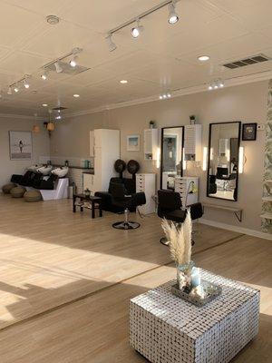 Gorgeous, clean salon with cute decor and amazing natural lighting.